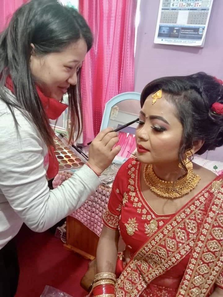 Bridal makeup application at Crystal Scissori