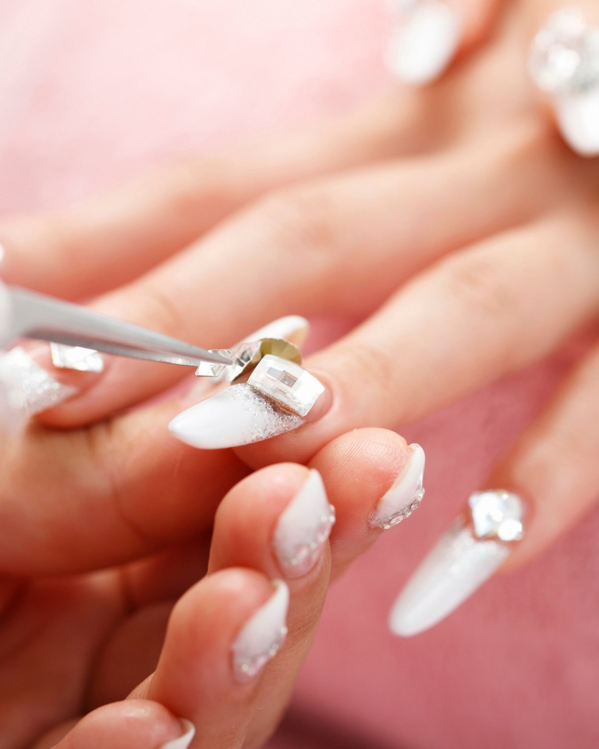 Bridal nail art with crystal accents at Crystal Scissori